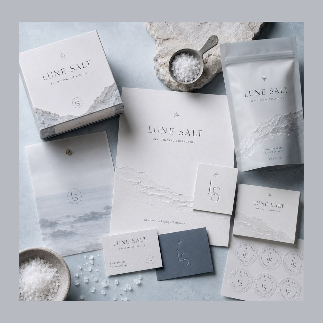A whole packaging range from above, every piece in the same pale blue and stone